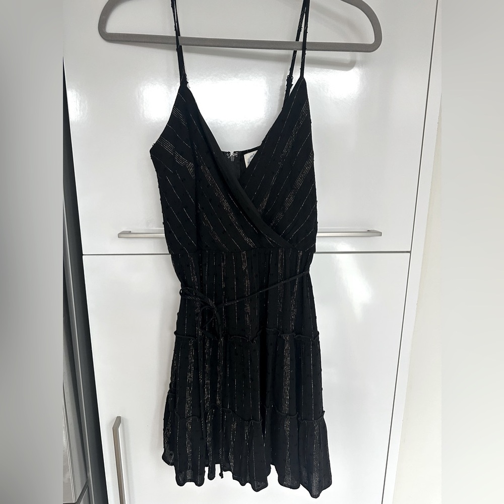 Blue rain (Francesca’s) LBD with gold details. Tie waistband.